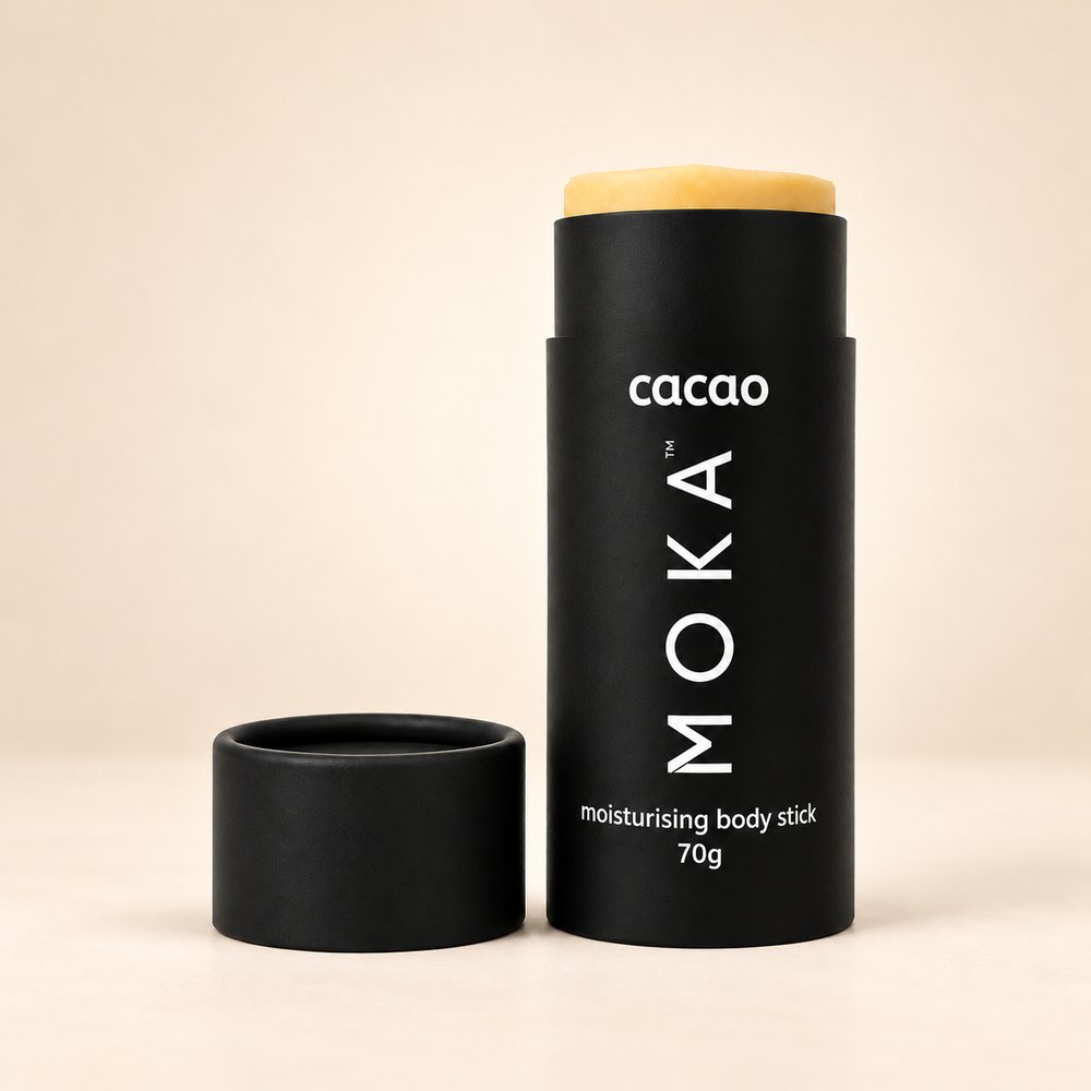 MOKA stick with its lid off on a cream backdrop